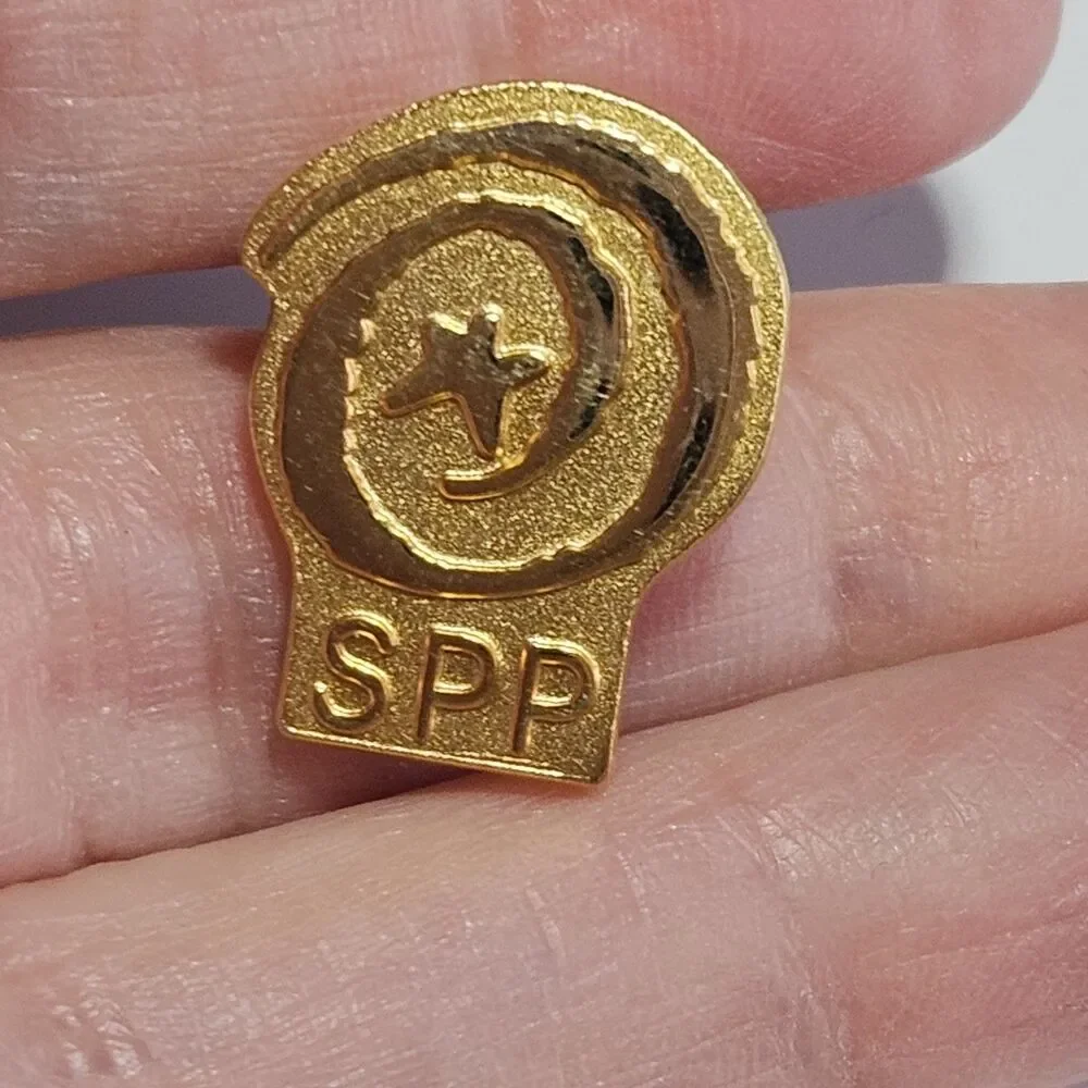 SPP Gold Tone Lapel Pin Featuring Star And Spiral Symbol Vintage Collectible